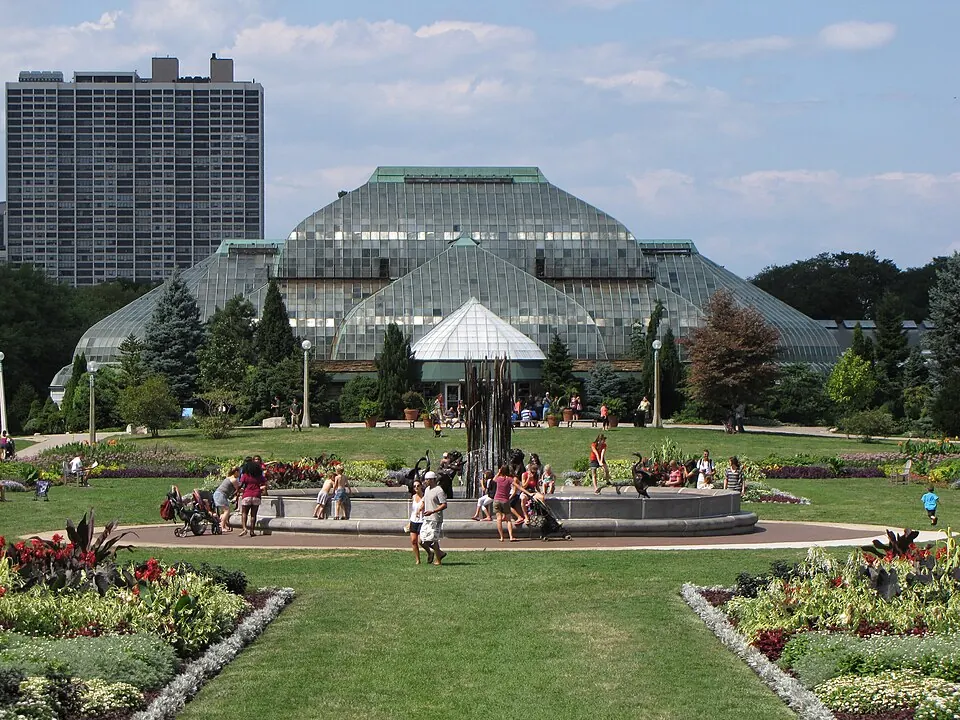 The Lincoln Park Conservatory and its gardens on a summer day